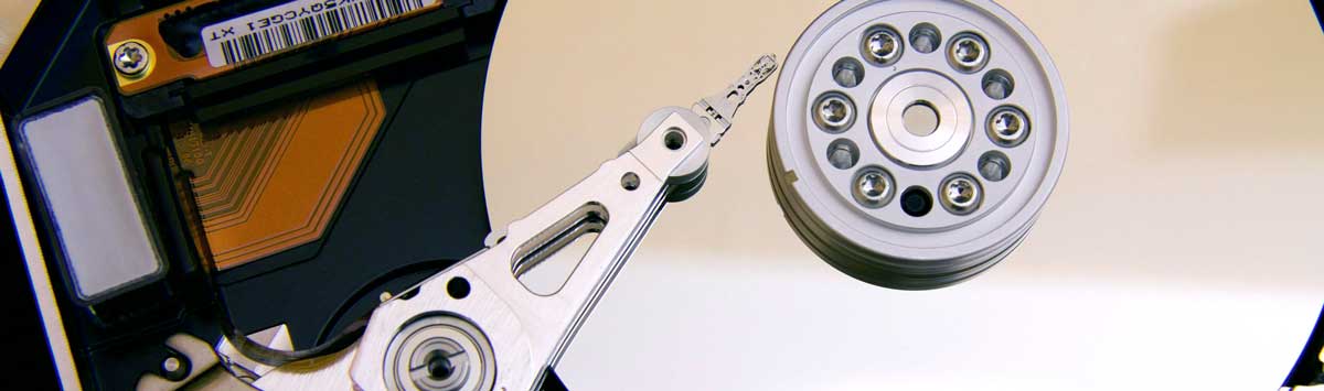 Open hard drive with internal components visible