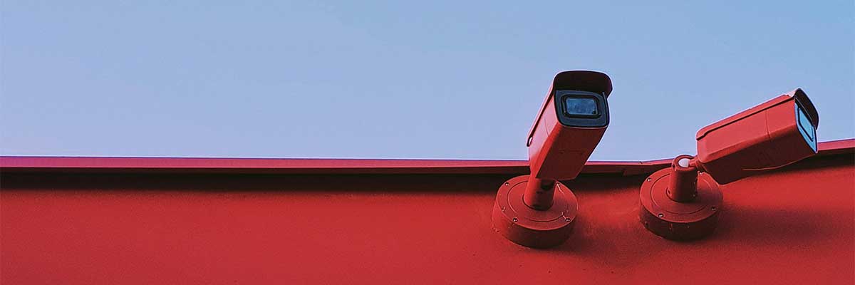 Various security cameras mounted on a pole